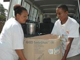 World Vision workers deliver supplies to the Mobile Eye Care Clinic